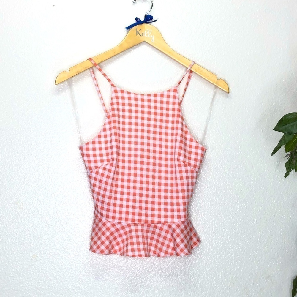 NWT Evolutionary Plaid Peplum Top
